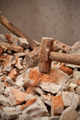 Hammer hitting on brick