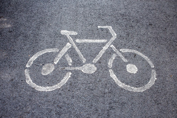 Naklejka na ściany i meble Bicycle sign on the road.