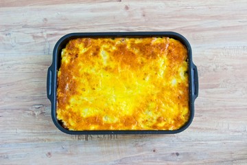 Potato casserole with eggs and meat. Horizontal image