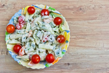 Fresh vegetable salad with sour cream. Horizontal image