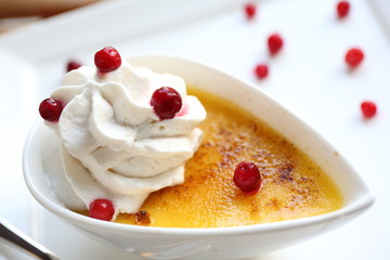 Creme brulee. Traditional French vanilla cream dessert with frui