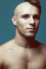 Naklejka premium Male beauty concept. Portrait of handsome muscular male model