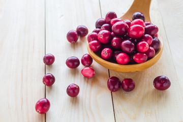 Cranberries wooden spoon background berry