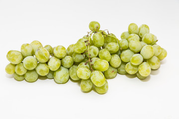 Bunch of Green Seedless Grapes on a White Background