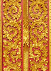 Door wood carving in temple, Thailand