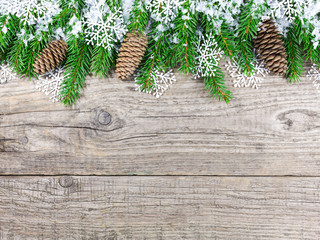 Naklejka premium Christmas fir tree with snowflakes