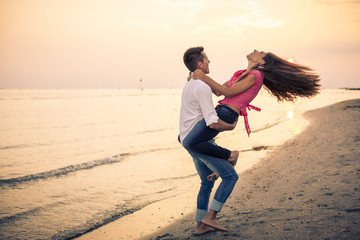 Beautiful Couple having fun on beach