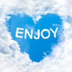 Fototapeta premium love enjoy word on blue sky