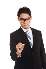 Asian businessman write with red marker