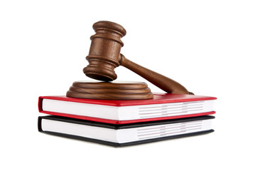 wooden mallet and a book