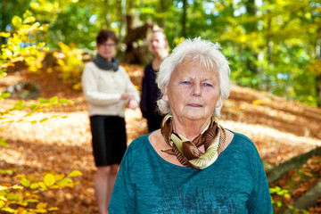 People in autumnal park