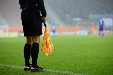 Soccer referee during the match on the stadium