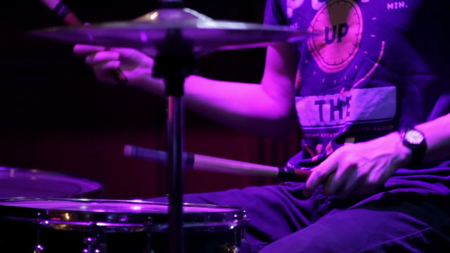 Drummer play in a nightclub