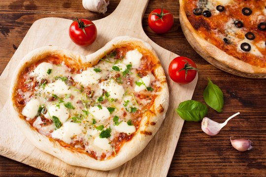 Herzpizza Photos Royalty Free Images Graphics Vectors Videos Adobe Stock