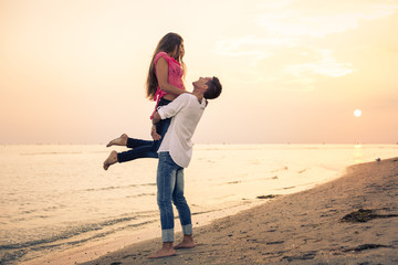 Beautiful Couple having fun on beach