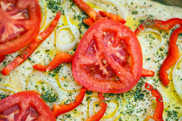 Tomato slice detail of traditional Italian focaccia bread