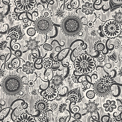 Seamless floral background pattern in vector.