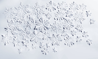 Paper snowflakes on white background