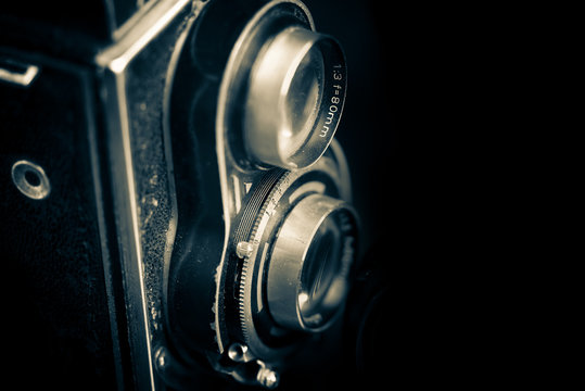 Vintage twin reflex camera isolated on black