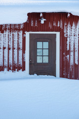 Snow covered door