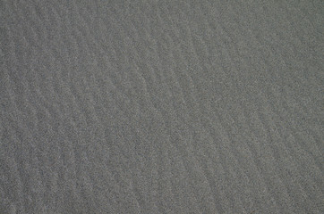 Obraz premium Gray sandy surface as background.