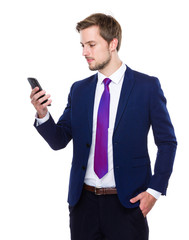 Naklejka premium Caucasian Businessman use of mobile phone
