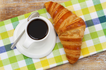 Black coffee and butter croissant
