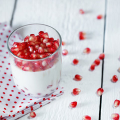 Jelly gelatin cream dessert or panna cotta with pomegranate seed