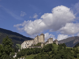 Fototapeta na wymiar Old castle on a hill in a sunny day of Summer, Austria