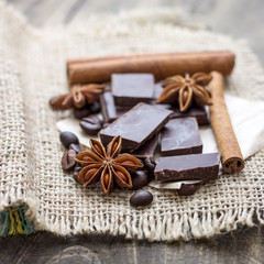 Chocolate crumbs, star anise and cinnamon sticks.
