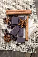 Chocolate crumbs, star anise and cinnamon sticks.