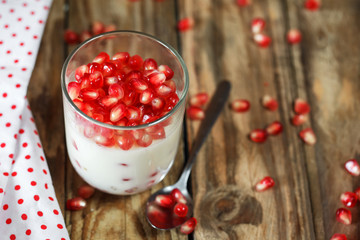 Jelly gelatin cream dessert or panna cotta with pomegranate seed