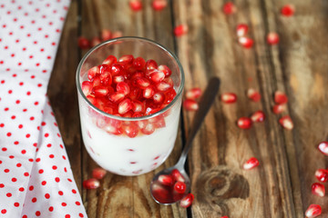 Jelly gelatin cream dessert or panna cotta with pomegranate seed