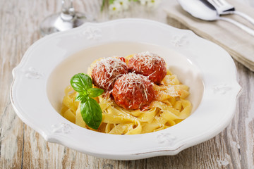 Pasta with meatballs and parmesan cheese