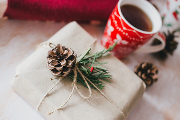 Christmas still life with XMAS letters, tea and present 