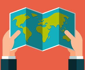 Flat hands holding a map