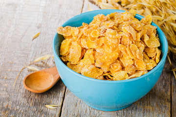 cornflakes on wooden table