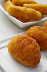 croquetas and calamares a la romana, spanish croquettes and brea