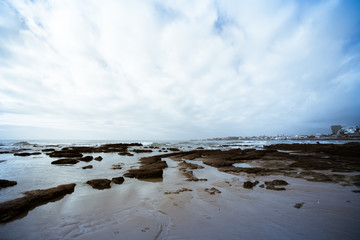 Atlantic coast at low tide near Cascais. tinted