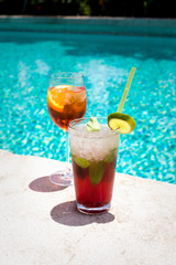 Glasses of Aperol Spritz and Mojito Royal cocktails