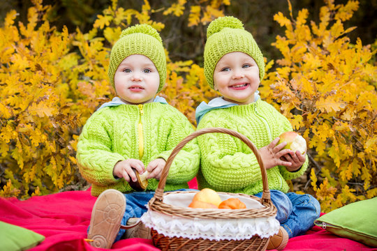 Happy Little Kids Twin Brothers On Walk