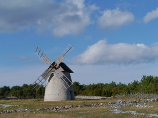 Fototapeta na wymiar Historic wind mill on the Swedish island faroe in Sweden