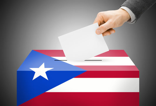Ballot box painted into national flag colors - Puerto Rico
