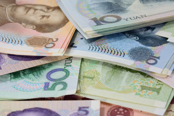 chinese Yuan banknotes (renminbi)  for money and business  conce