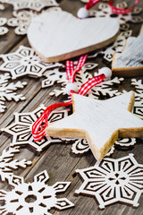 white wooden star and heartand wooden snowflake