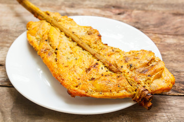 Grilled chicken with turmeric.