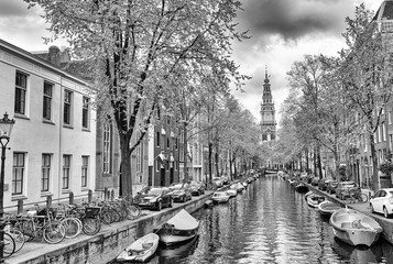 Fototapeta premium Amsterdam. Wonderful view of city canals and buildings in spring