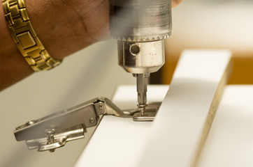 closeup drilling on wood
