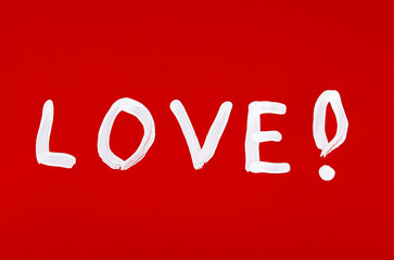 Love word painted over red