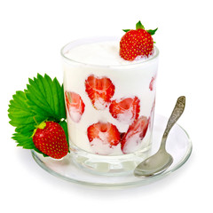 Yogurt thick with strawberries in glass and spoon